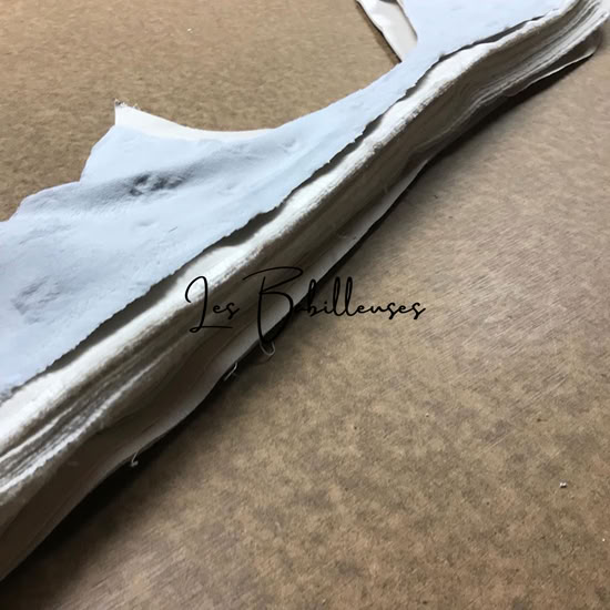 Un carton de chutes de nos tissus