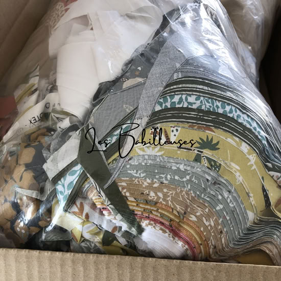 Un carton de chutes de nos tissus